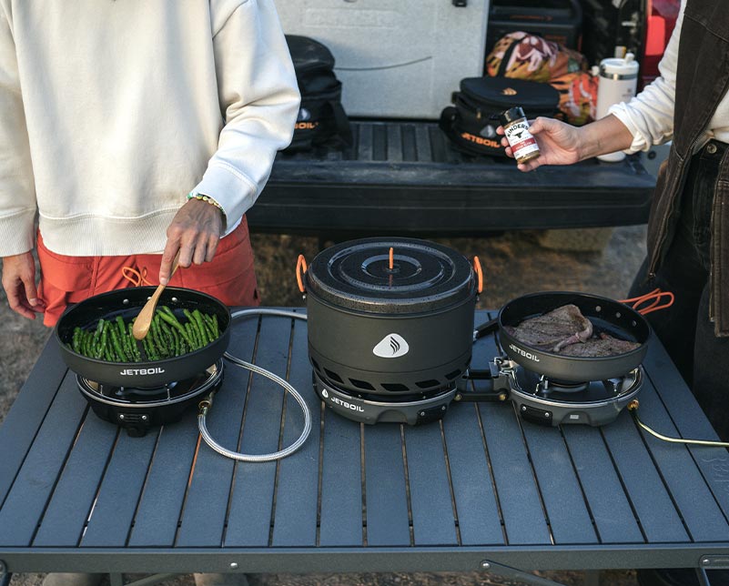 Jetboil HalfGen Cooking Stove connected to Genesis Basecamp System Jetboil HalfGen Cooking Stove connected to Genesis Basecamp System
