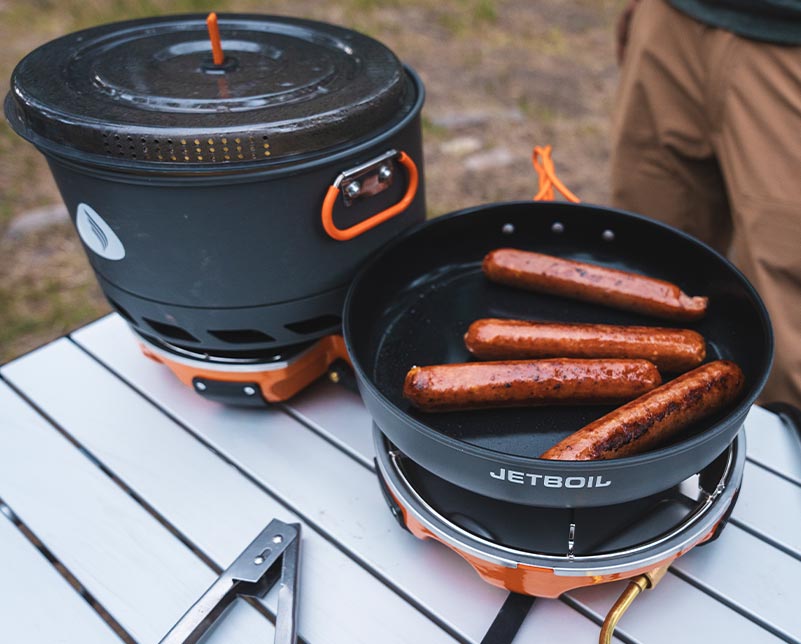 Cooking hotdogs on the Jetboil Genesis Basecamp System