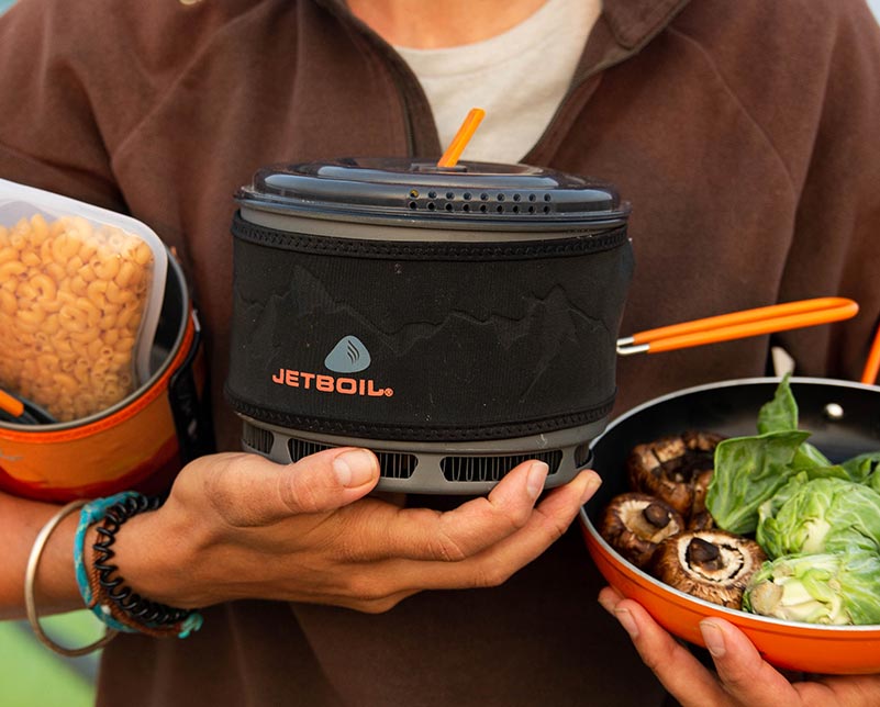 Holding Jetboil ceramic cook pot