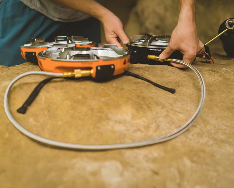 JetLink hose connected to Jetboil Genesis and HalfGen stoves