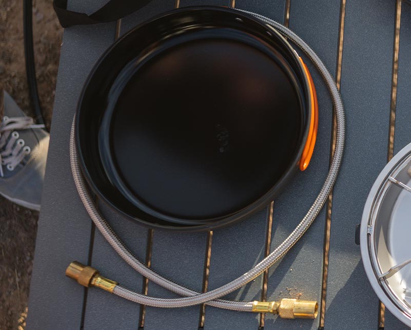 Jetboil JetLink hose wrapped around 10" Fry Pan