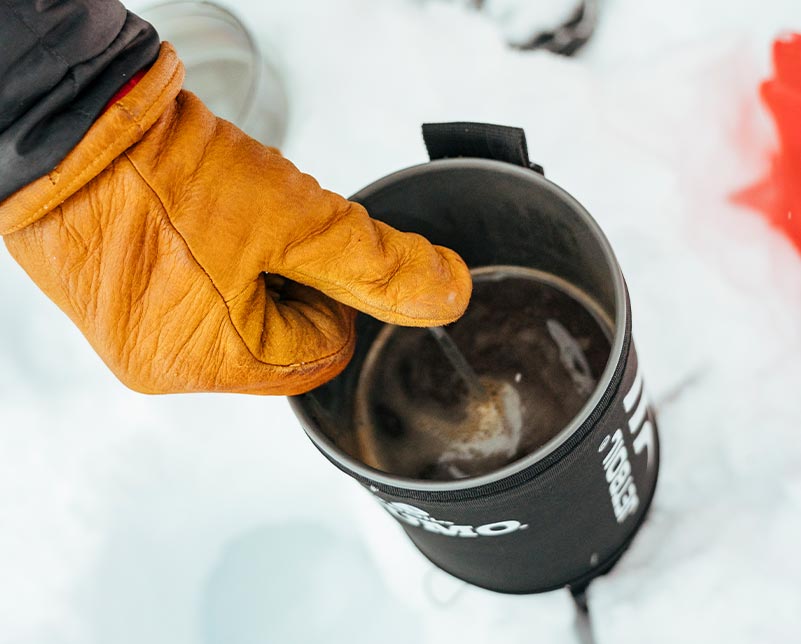 Using silicone coffee press in Jetboil SUMO cooking system making delicious coffee