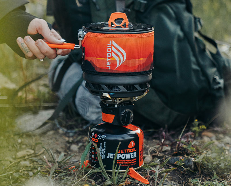 Holding folding handle on the Jetboil TrailCook 1.2L Cook System
