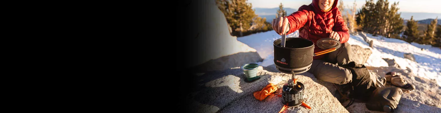 Stirring cooked meal in the Jetboil Ceramic Cook Pot and Mighty Mo