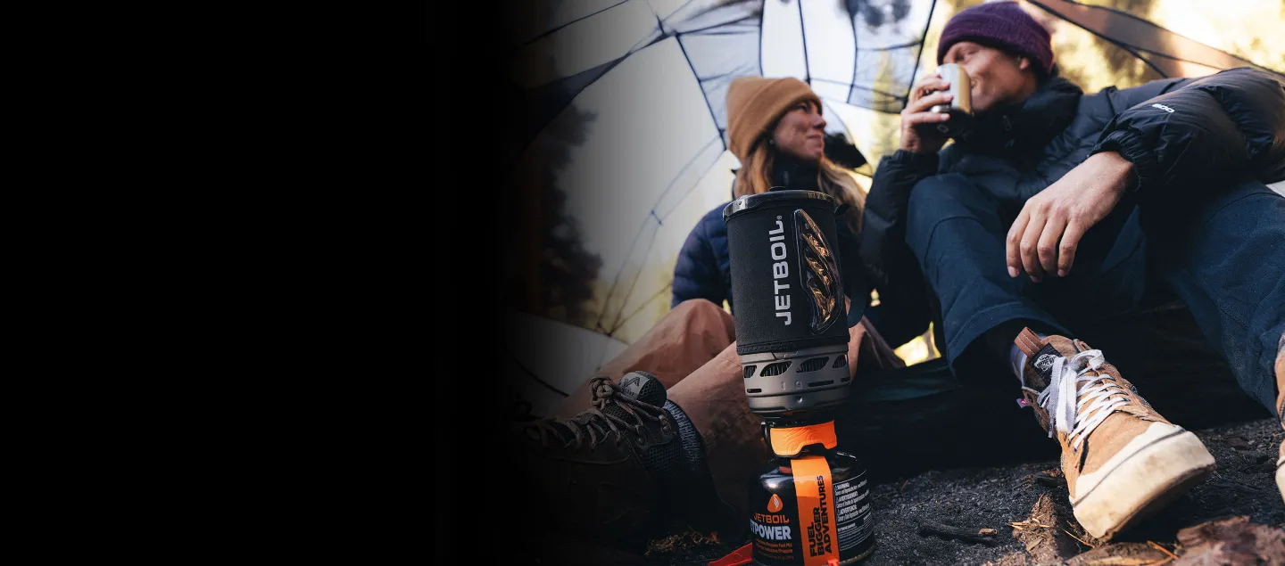 Two happy backpackers in tent with Jetboil Flash 1.0L cooking system