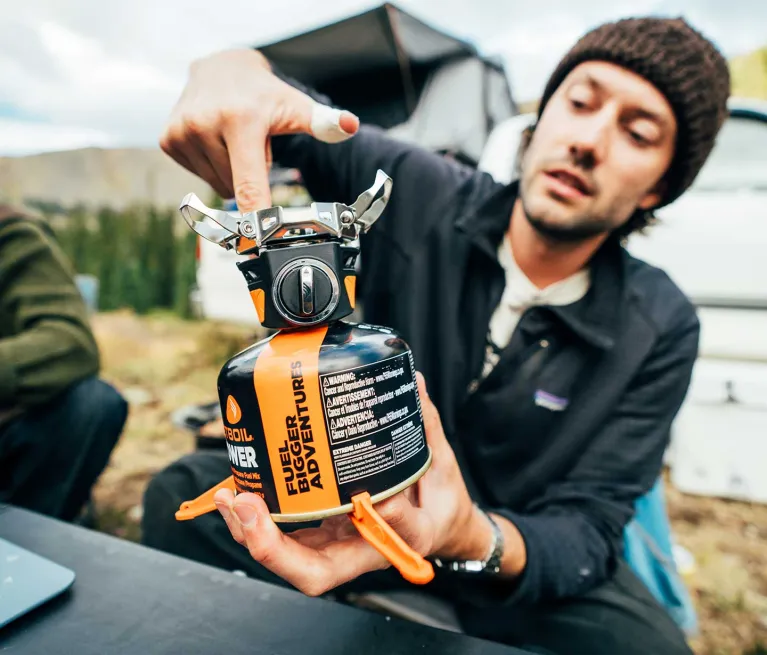 Pointing at the Self-Centering Pot Support on the TrailCook system