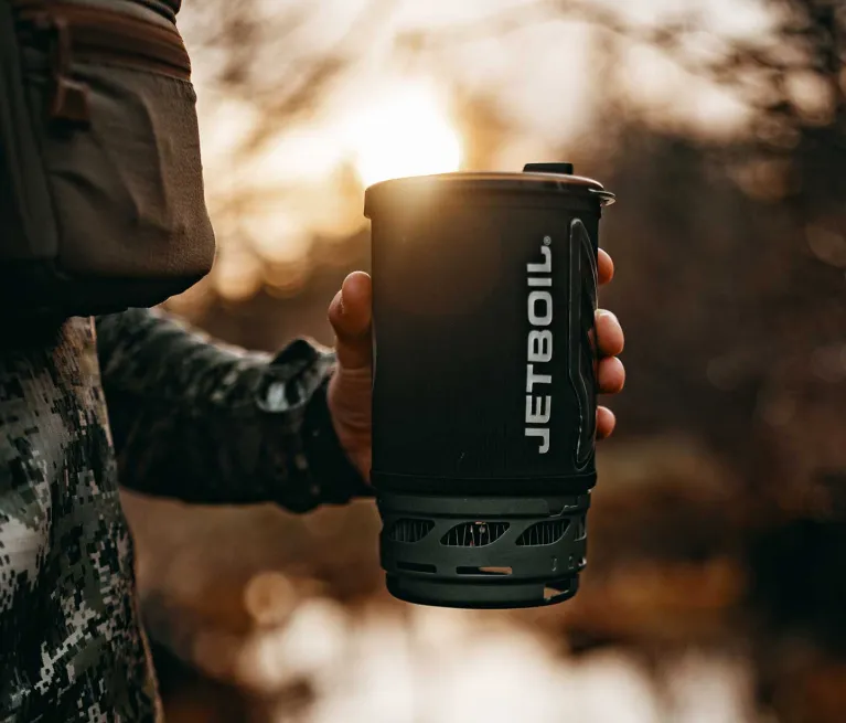 Hand holding Jetboil Flash 1.0L system in hand
